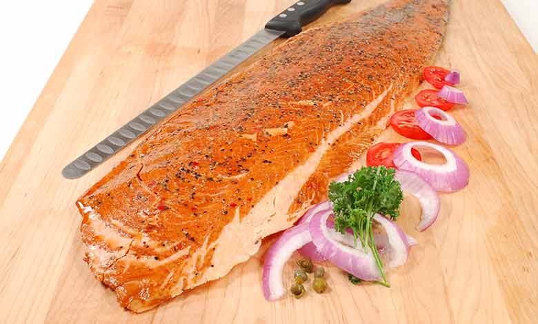 An example of serving smoked salmon fillet with onion rings, photo by Gourmet Food Store